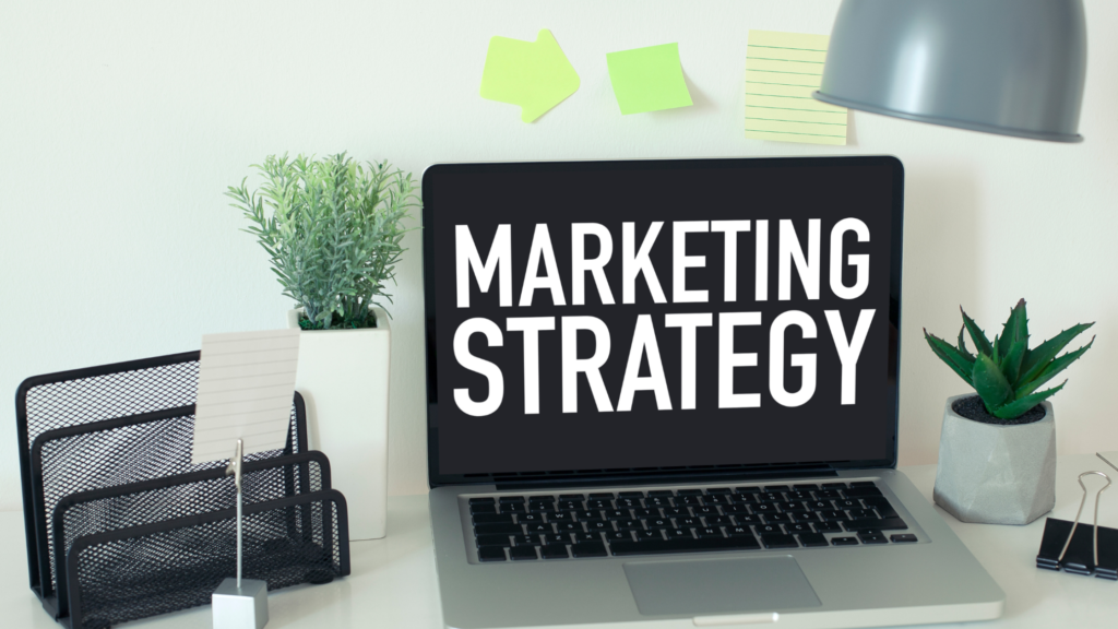Laptop screen with the words Marketing Strategy